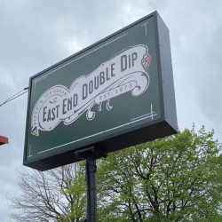 EAST END DOUBLE DIP POLE SIGN